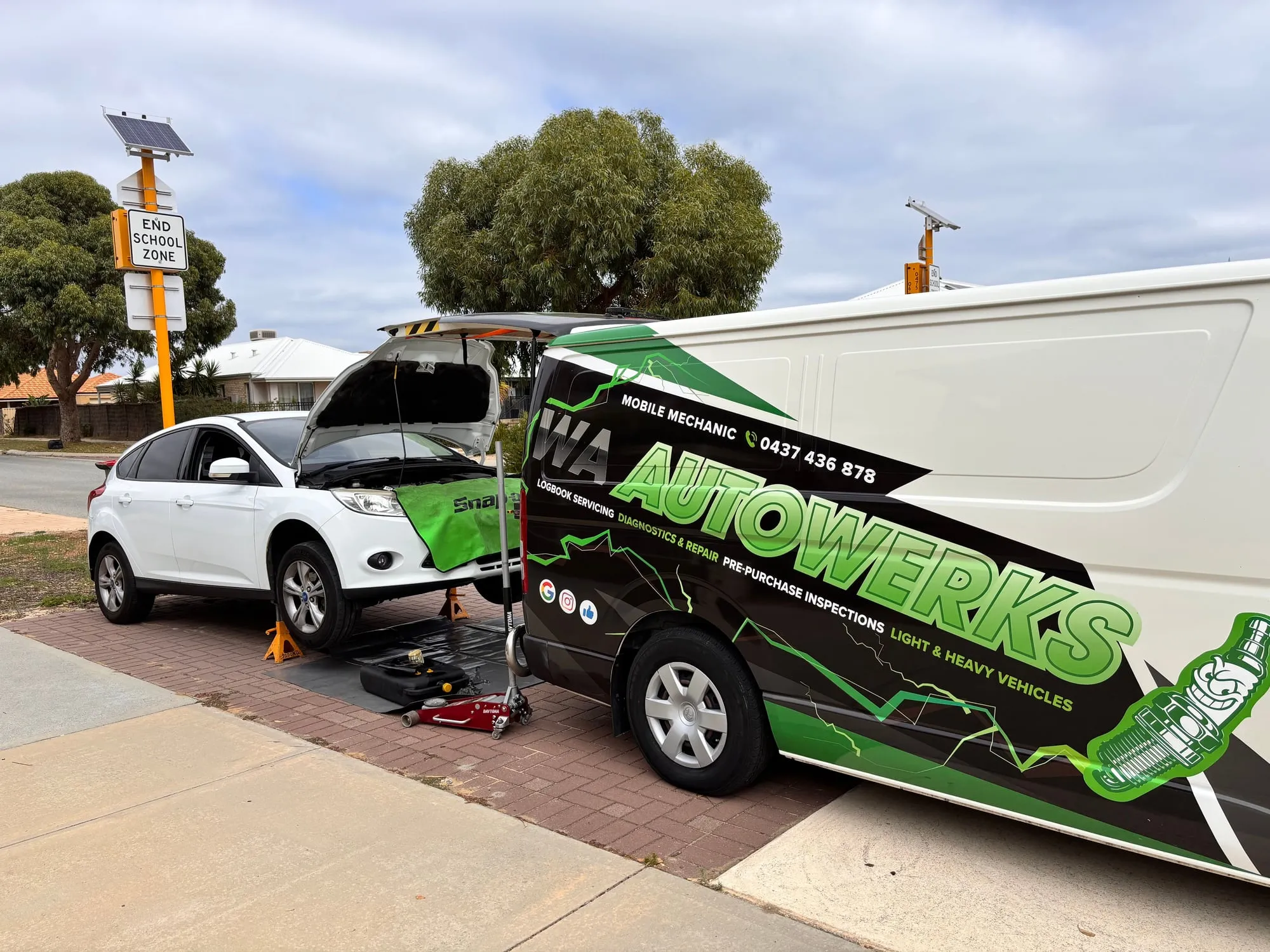 Andy from WA Autowerks servicing a vehicle on the roadside